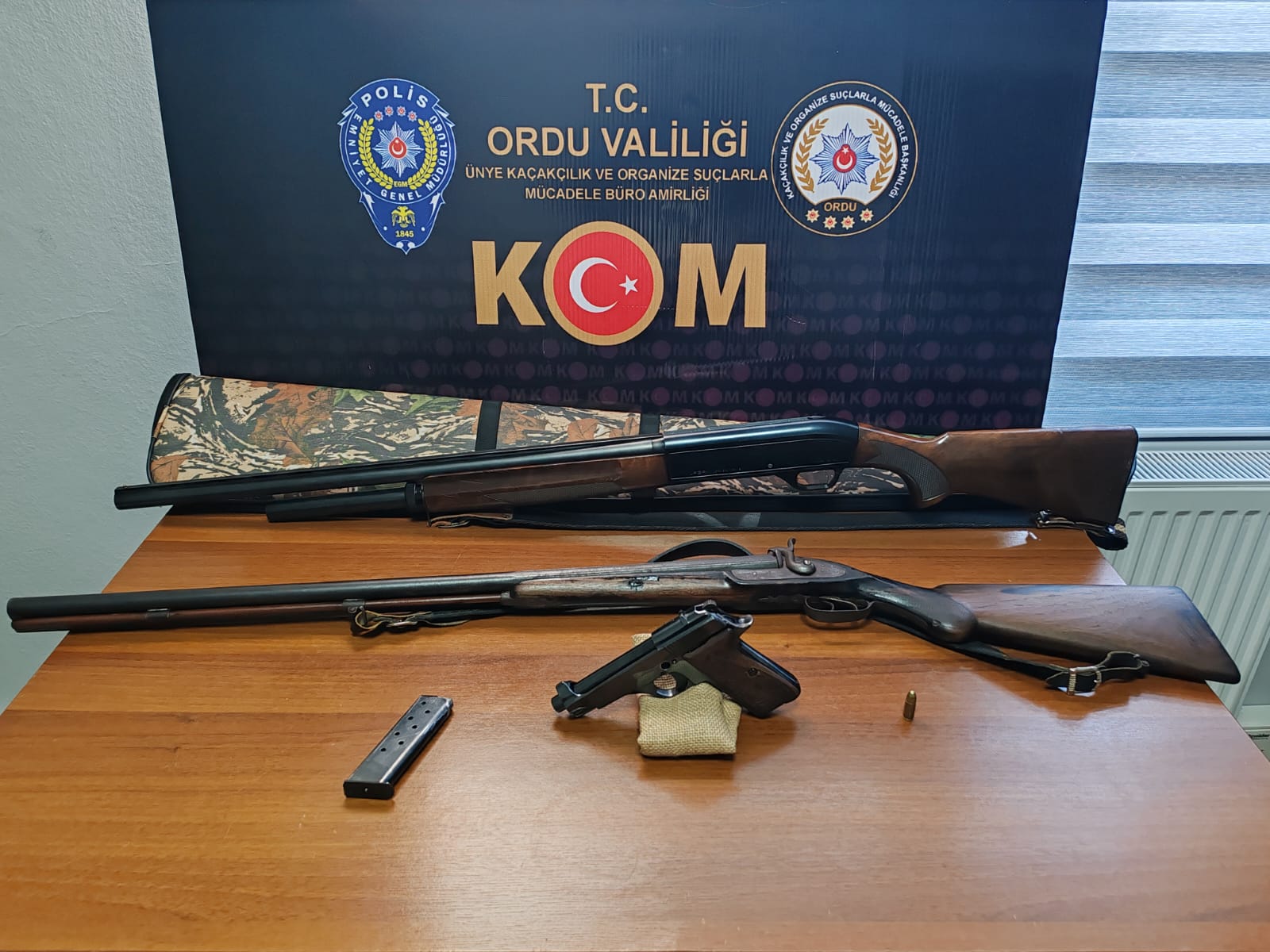 KOM 1